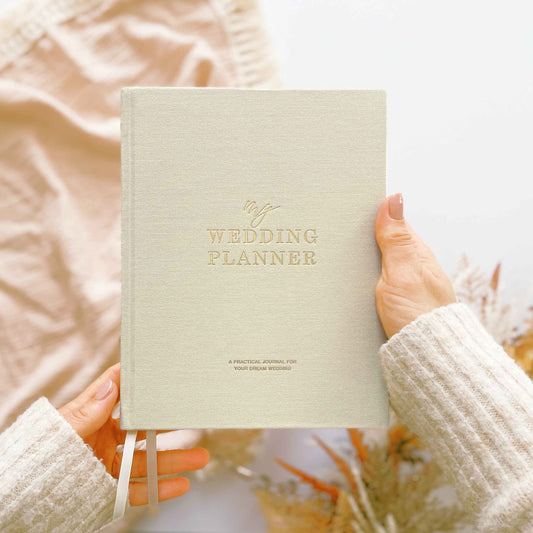 Ivory Cloth Wedding Planner
