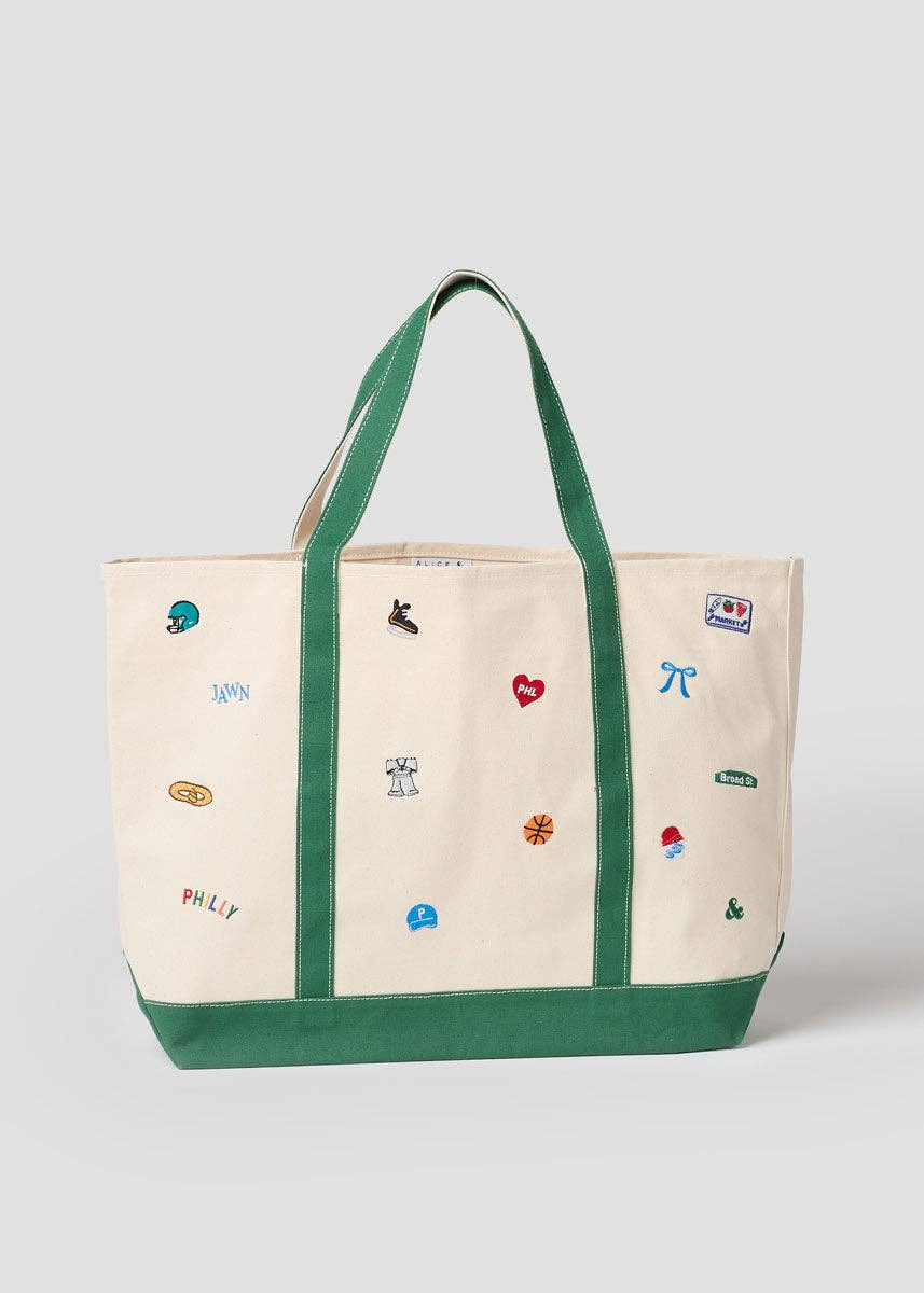 Tote bag with embroidered designs on a white background