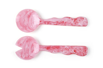 Two pink marbled dumbbells on a white background